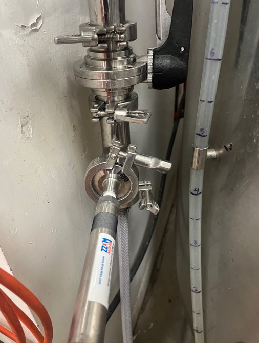 Photo: tri-clamp tee and isolation valve fitted on a brite tank CIP arm