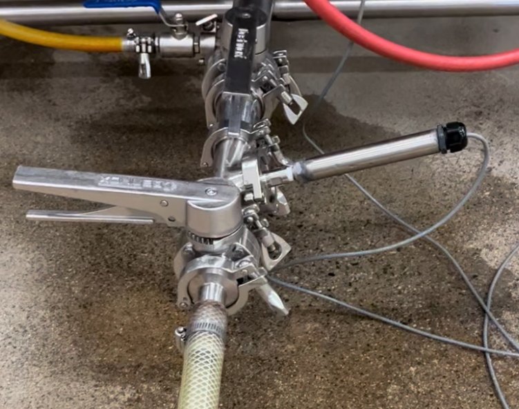 Photo: Foot Pressure Sensor installed between two butterfly valves, tank side valve open
