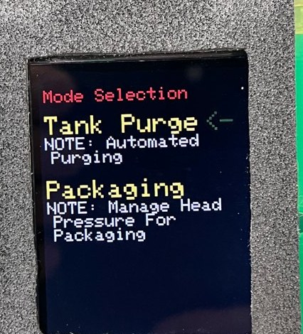 PacWizz display showing the Mode Selection screen with Tank Purge and Packaging options